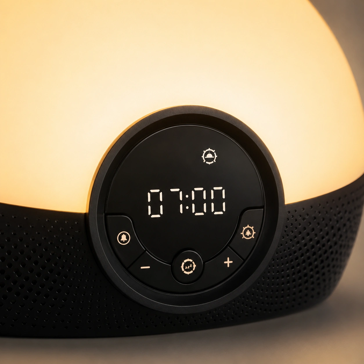 Front product view of the Lumie Bodyclock Rise150 Alarm Clock with a soft warm yellow glow. Front product view of the Lumie Bodyclock Rise150 Alarm Clock with a soft warm yellow glow.